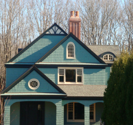 House with custom chimney cap